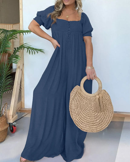 Wyn™ | Feminine Flair Smocked Jumpsuit Navy Blue Jumpsuit