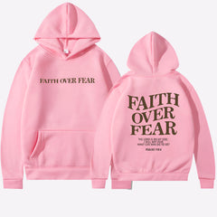 Pink Faith Over Fear Hoodie featuring inspirational text on front and back, promoting confidence and courage.