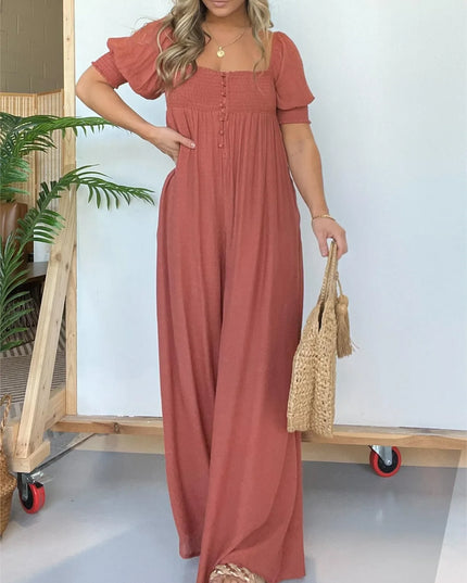 Wyn™ | Feminine Flair Smocked Jumpsuit Fuchsia Jumpsuit